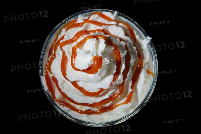 Top view of glass of smoothies isolated on black