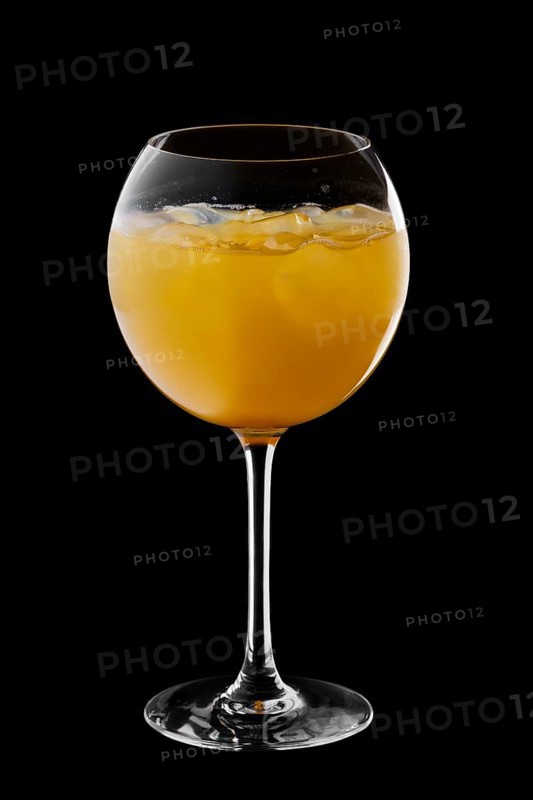 Cold sangria in wine glass isolated on black background