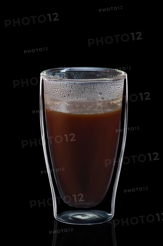 Double-walled glass with coffee isolated on black. Photo with clipping path