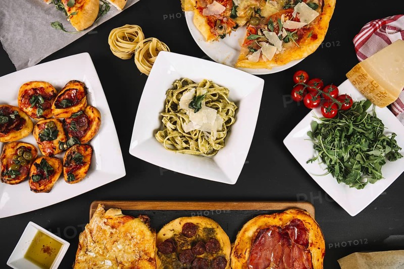 Vegetables pizzas near pasta. Resolution and high quality beautiful photo