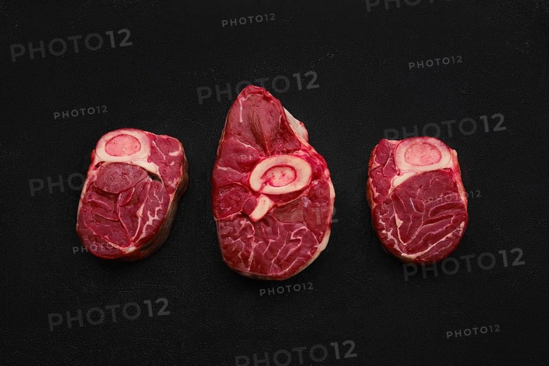 Overhead view of tree raw beef shank cross cut