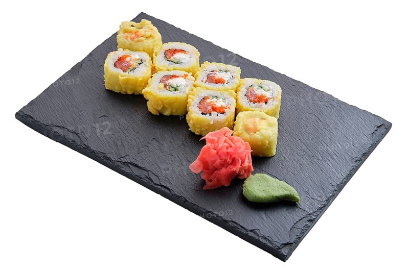 Bonito rolls with garnish isolated on white background