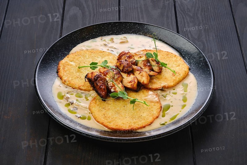 Potato fritters with teriyaki chicken fillet