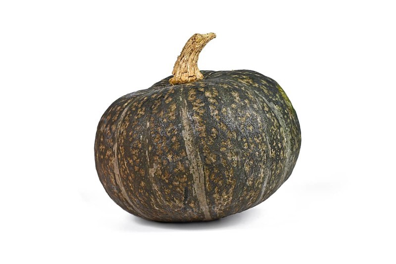 Green Kabocha Hokkaido squash on white background