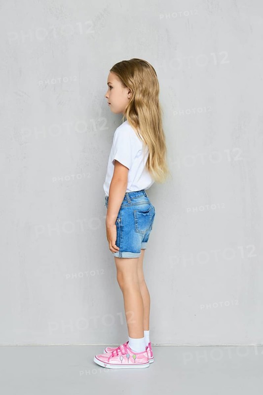 Little child girl in white t-shirt