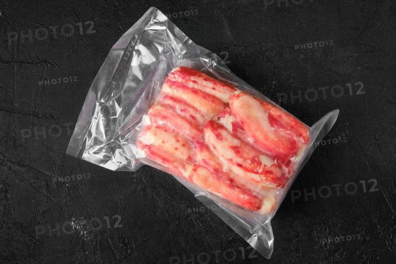 Overhead view of vacuum packed king crab meat