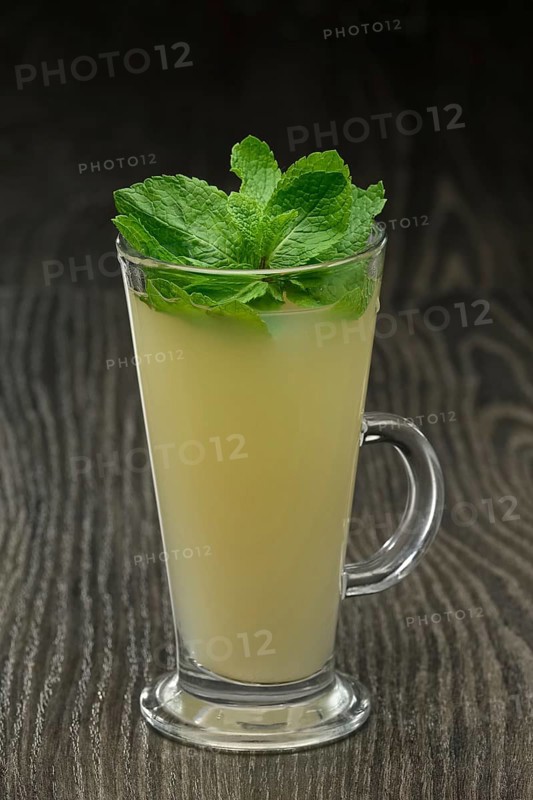Glass of hot tea with ginger