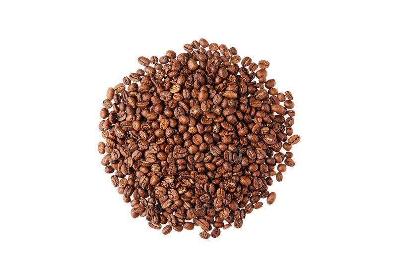 Overhead view of columbian coffee beans isolated on white background