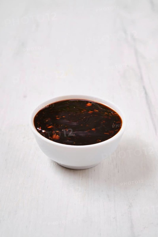 Small bowl with spicy teriyaki sauce