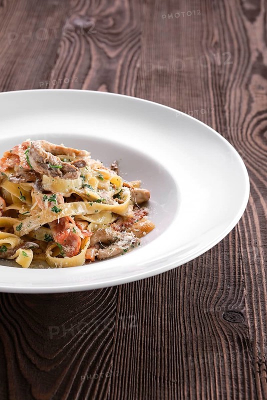 Pasta with bacon and squid
