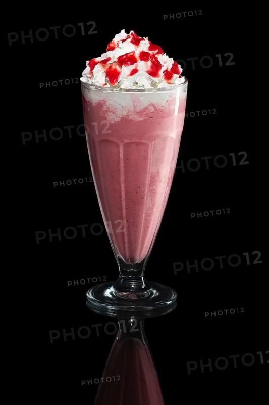 Milkshake strawberry summer cocktail isolated on black