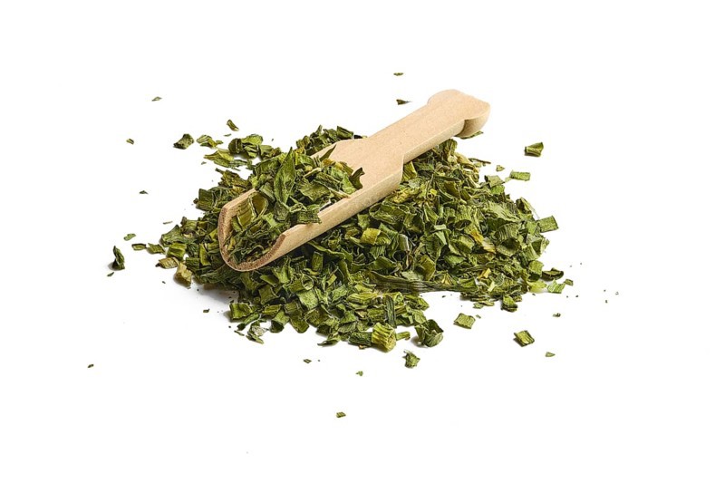 Heap of dry scallion on white background