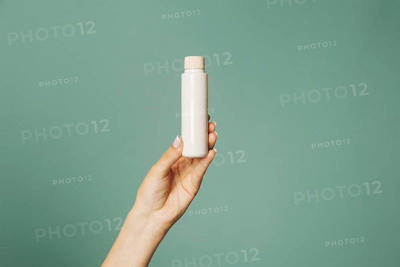 Cosmetic product female hand