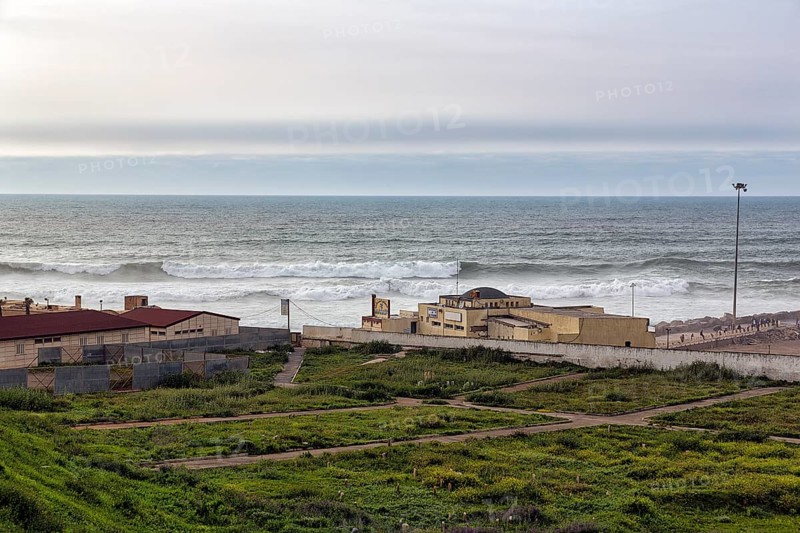 Restaurant and Muslim cemetery by the sea
