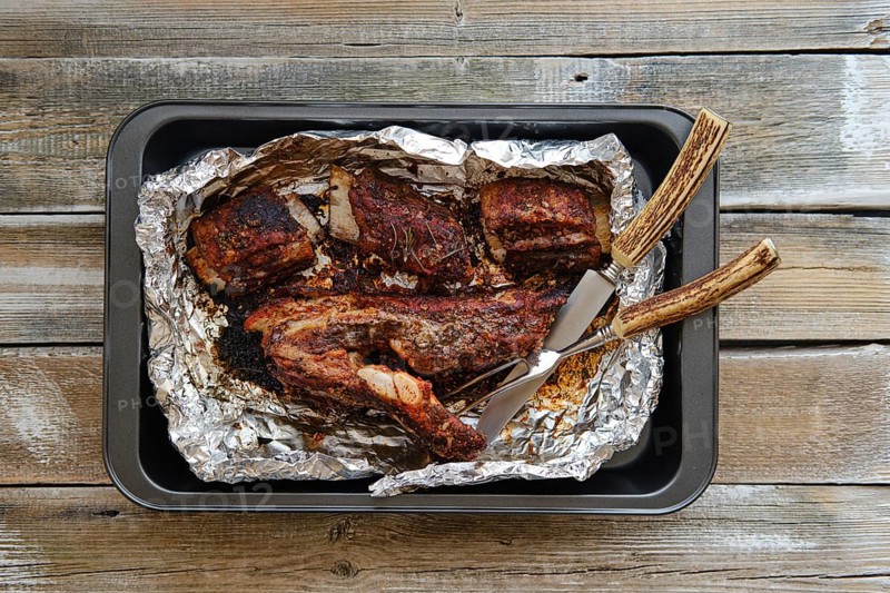 Top view of beef ribs baked in oven