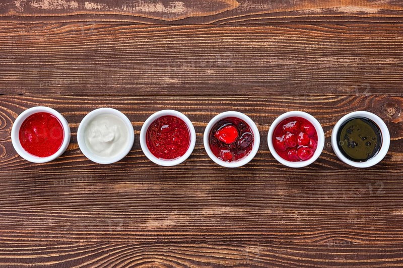 Overhead view of assortment of fruit puree. Jam