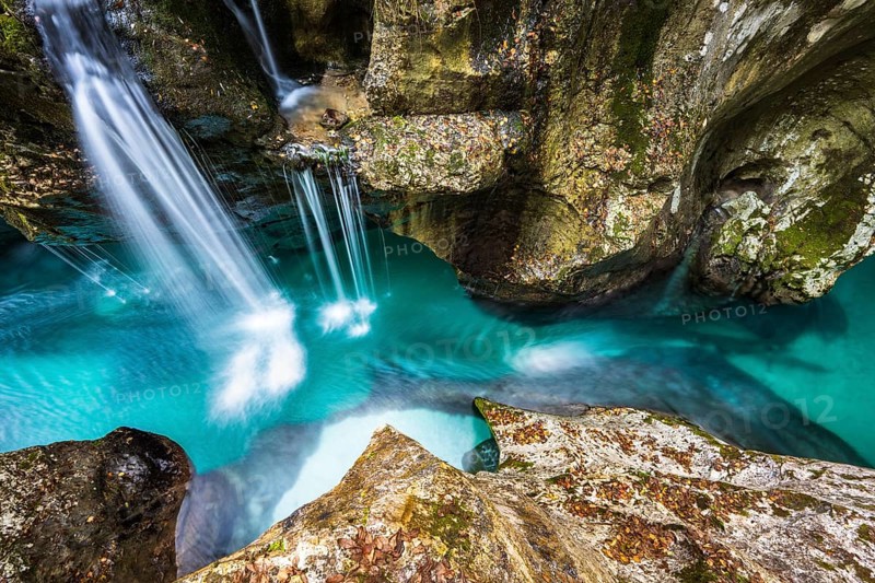Mountain river Soca flows through narrow canyon