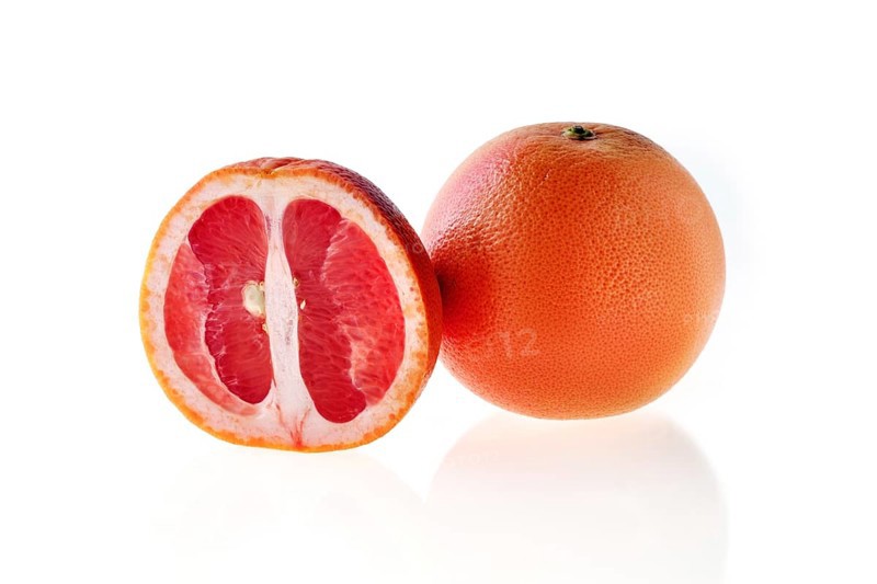 Fresh red grapefruit isolated on white background
