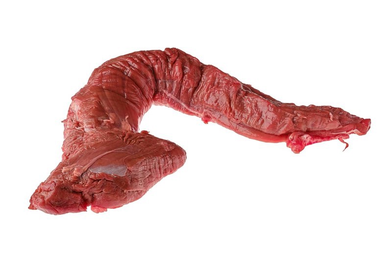 Overhead view of raw fresh top round beef strip isolated on white background
