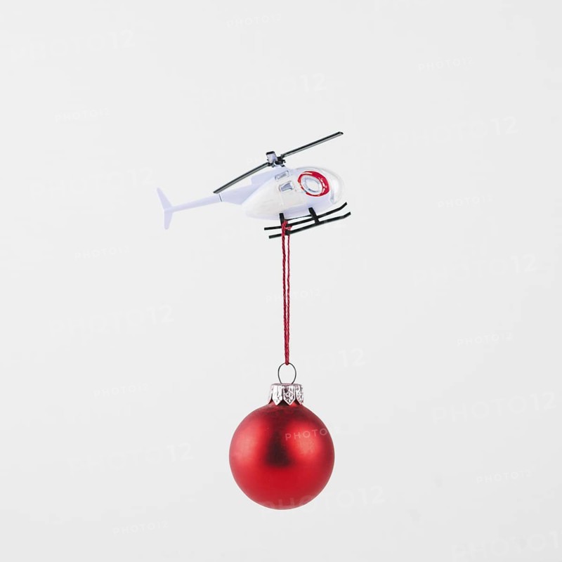 Small bauble hanging flying helicopter. Resolution and high quality beautiful photo