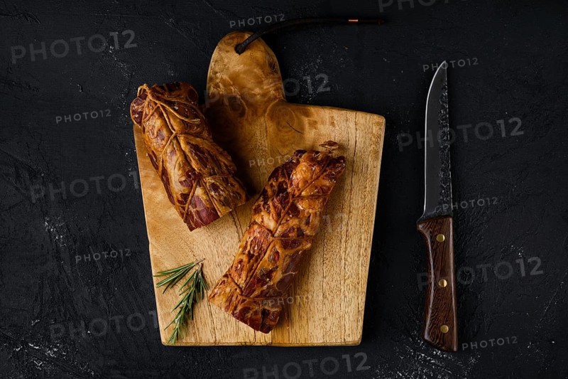 Top view of smoked beef fillet meat on cutting board