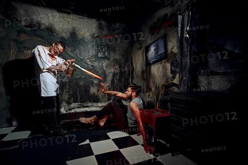 Psycho killer tortures with gas burner miserable bleeding victim