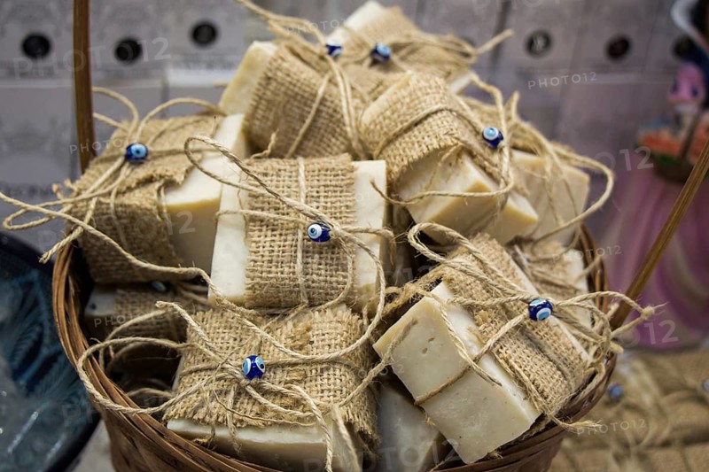 Collection of bars of fragrant hand made organic soap in a basket