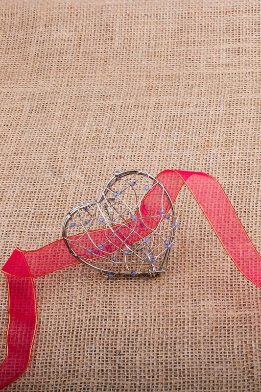 Band and Heart shaped cage on linen canvas