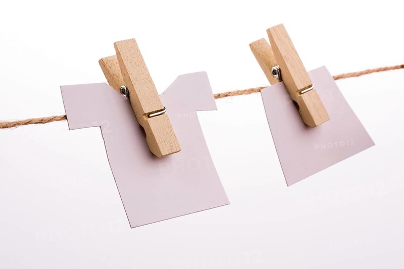 Clothespins holding clothes