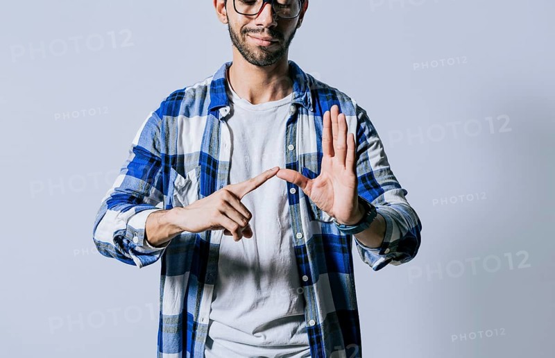 Deaf and dumb people speaking in sign language. Man speaking in sign language. Manual gestures of people with hearing problems. Person speaking in sign language