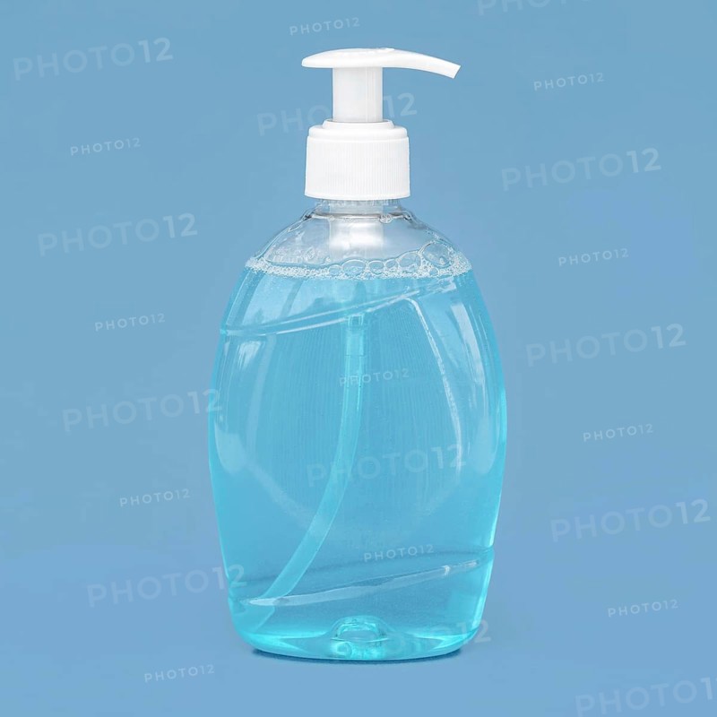 Transparent bottle liquid soap blue background. Resolution and high quality beautiful photo