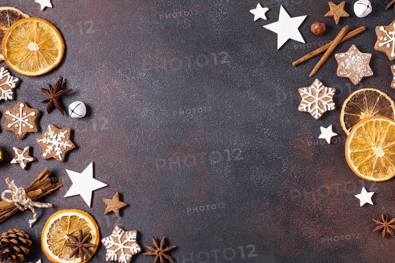 Flat lay gingerbread cookies dried citrus christmas with copy space