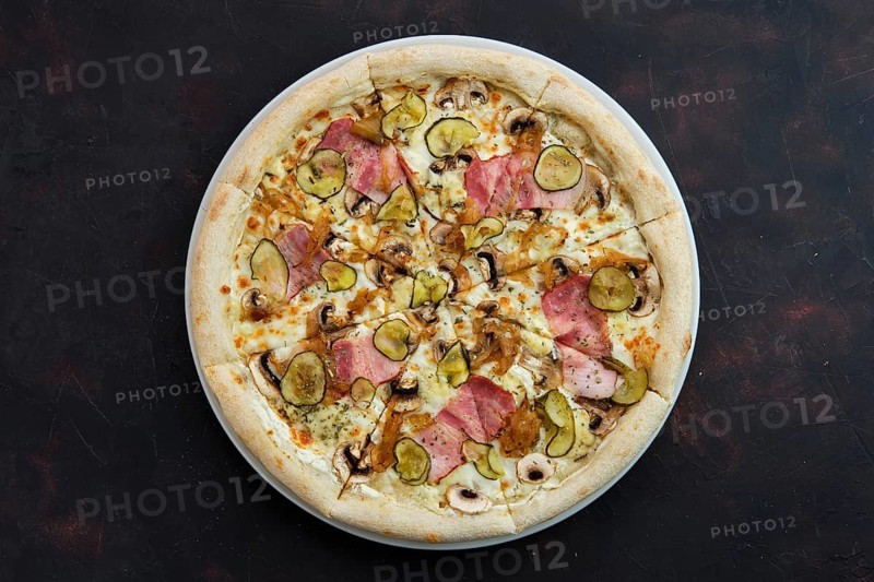 Top view of pizza with bacon