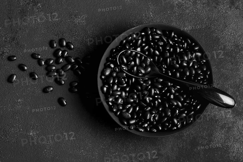 Flat lay arrangement black beans dark background