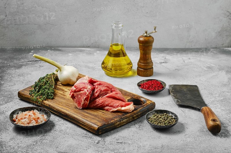 Raw uncooked section of lamb leg
