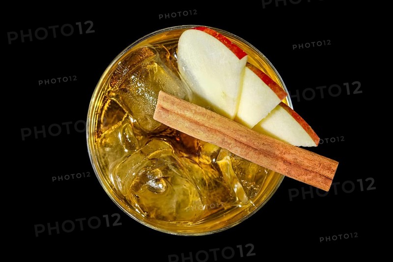 Top view of whiskey with apple juice