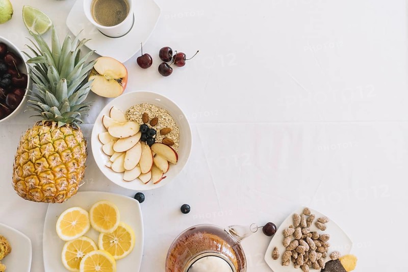 Elevated view fresh healthy breakfast white background