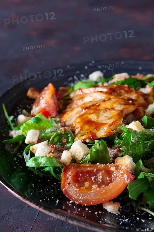 Fried turkey fillet with arugula