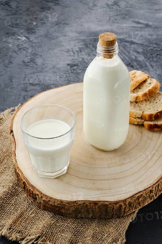 Bottle and a glass of fresh milk