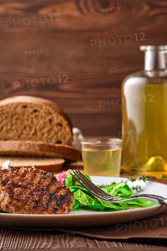 Grilled beef cutlet with fresh salad
