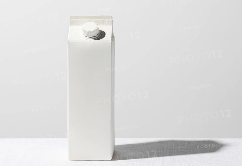 Front view milk carton with copy space