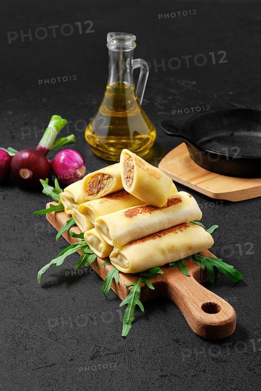 Thin crepe stuffed with chicken offal