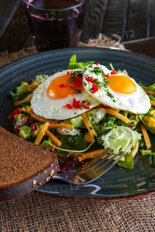 Fried eggs with avocado