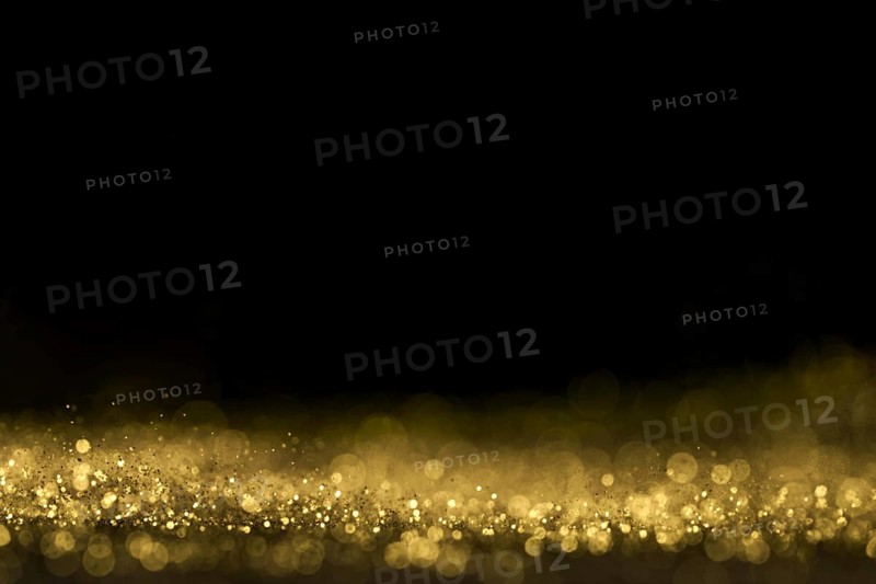 Close up golden glitter with copy space