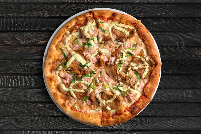 Overhead view of pizza on the table