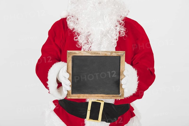 Santa claus showing empty wooden frame. Resolution and high quality beautiful photo