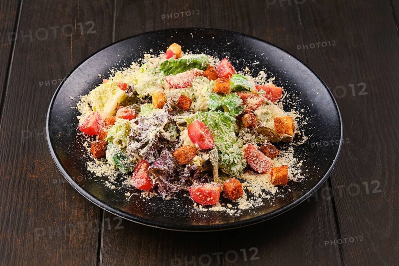 Caesar salad with fresh vegetables
