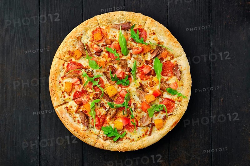 Top view of pizza with pumpkin