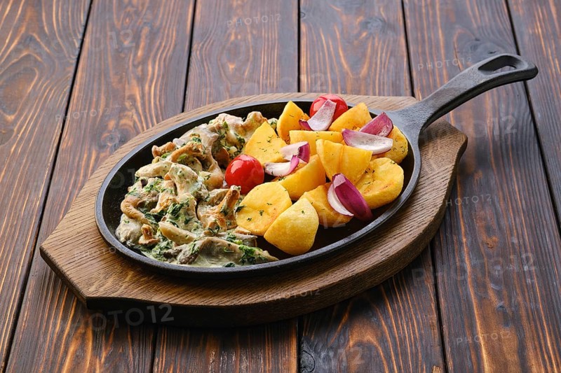 Cast iron skillet with fried chanterelles