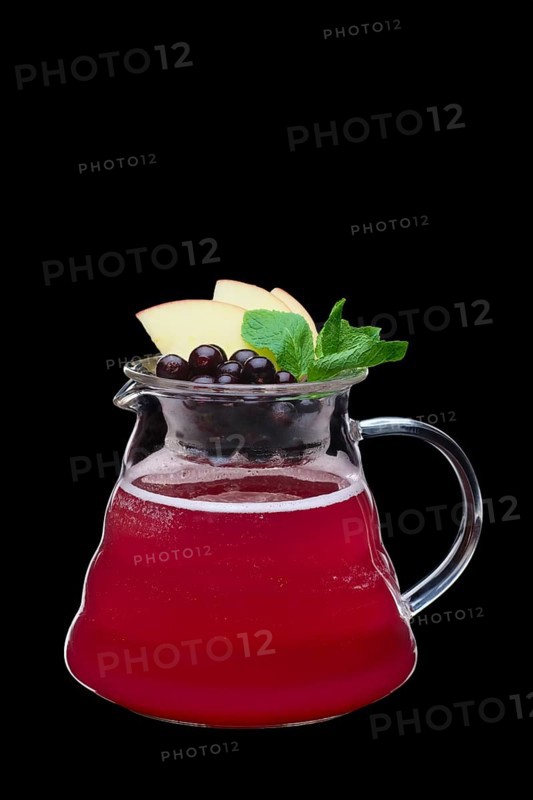 Apple and black currant hot tea isolated on black. Healthy raw food concept. Photo with clipping path